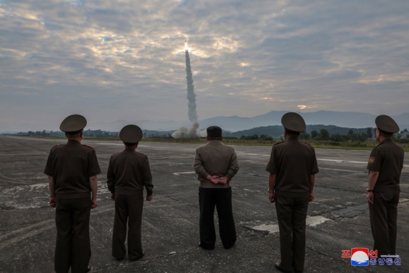 North Korean leader Kim Jong Un oversees the test-fire of a new-type tactical ballistic missile Hwasongpho-11-Da-4.5 and an improved strategic cruise missile at an undisclosed location in North Korea in a photo released Thursday by state-run media. Photo by KCNA/EPA-EFE