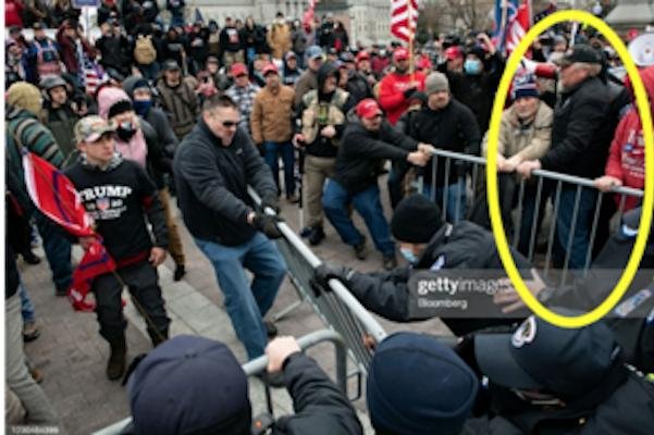 Ohio pastor William Dunfee (R) was sentenced Thursday to 30 months in prison and ordered to pay $12,000 for his actions during the Jan. 6, 2021 attack on the U.S. Capitol by a violent pro-Trump mob. The attack disrupted the peaceful transfer of presidential power. Photo courtesy Justice Department