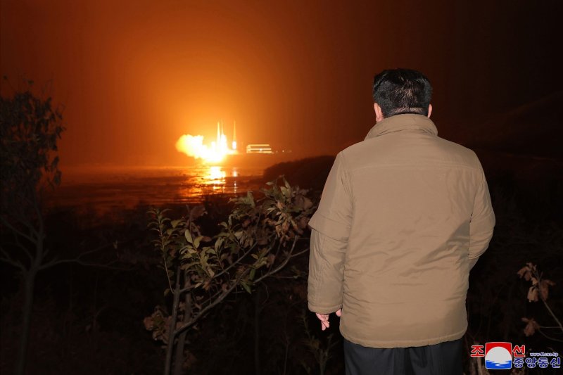 A photo released by the official North Korean Central News Agency on November 22, 2023, shows North Korean leader Kim Jong Un overseeing the launch of a new-type carrier rocket 'Chollima-1' carrying the reconnaissance satellite 'Malligyong-1' at the Sohae Satellite Launching Ground in Cholsan County, North Phyongan Province, North Korea. A panel of experts in Seoul on Friday said the path to a denuclearized North Korea is through reunification. File KCNA/EPA-EFE