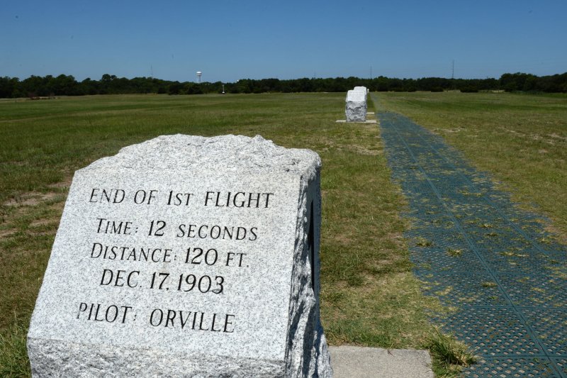 Marker for the first flight of the Wright brothers can be seen at the Wright Brothers National Memorial in Kill Devil Hills near Kitty Hawk on the Outer Banks of North Carolina on July 25, 2015. File Photo by Pat Benic/UPI