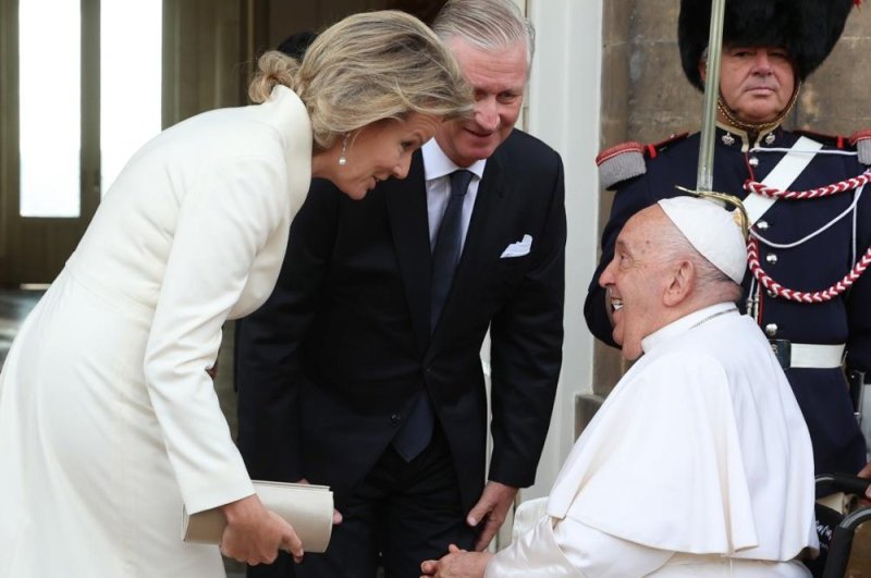 Pope Francis (R front) is welcomed by the Belgian royal couple, King Philippe (C) and Queen Mathilde (L), during a private meeting at Castle of Laeken, the official residence of the Belgian royal family, in Laken, near Brussels, Belgium, on Friday. Photo by Olivier Hoslet/EPA-EFE