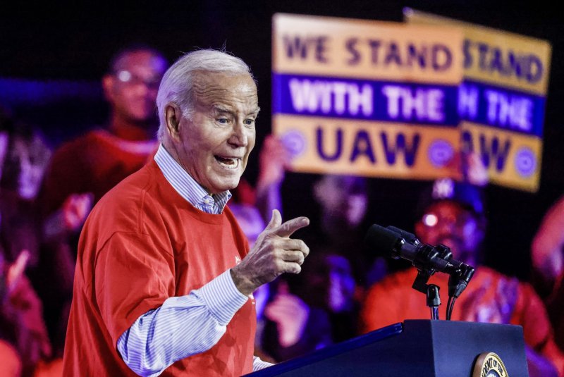 President Joe Biden on Friday signed what the White House called a landmark pro-union labor standards executive order during a trip to Ann Arbor, Mich. In 2023, Biden became the first sitting president to walk a union picket line with striking UAW workers in the state. File Photo by Tannen Maury/UPI