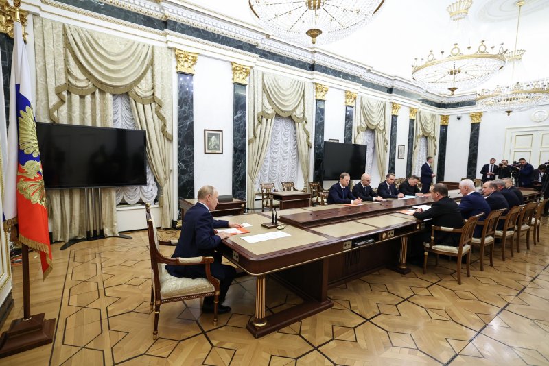 Russian President Vladimir Putin (L) chairs a meeting of his security council on nuclear deterrence at the Kremlin in Moscow on Wednesday at which he trailed the introduction of a slew of clarifications to the conditions under which Russia would resort to nuclear weapons. Photo by Alexander Kazakov/Sputnik/Kremlin Pool/EPA-EFE