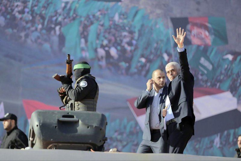 Yahya Sinwar, head of the Palestinian Islamic resistance movement Hamas, waves as he attends a rally in Gaza City In December 2022, marking the 35th anniversary of the group's foundation. File Photo by Hamas Movement Press Office /UPI