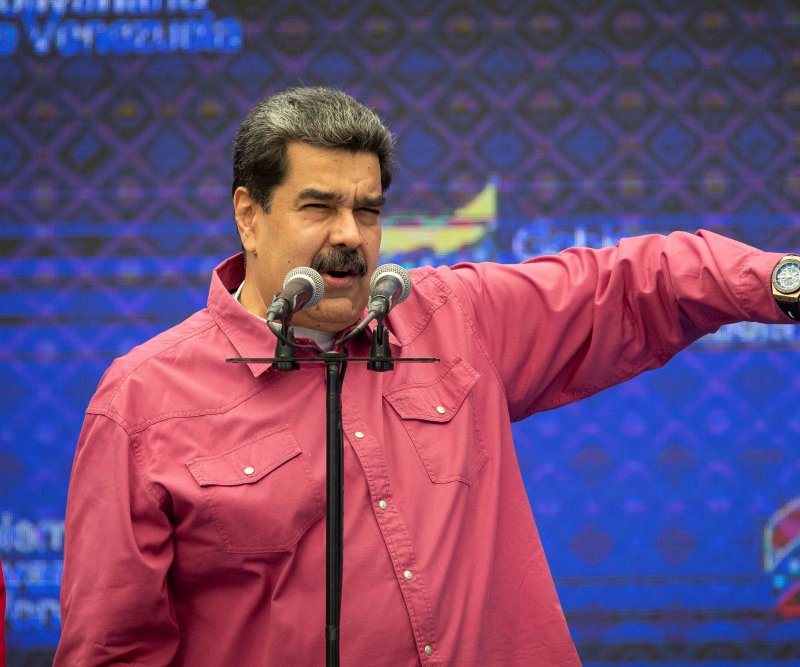 Venezuelan President Nicolas Maduro delivers a speech after voting in Caracas, on December 6, 2020. The Treasury Department has sanctioned more than a dozen people who are part of his regime for violating the rights of his political opponents. File Photo by Rayner Pena/EPA-EFE