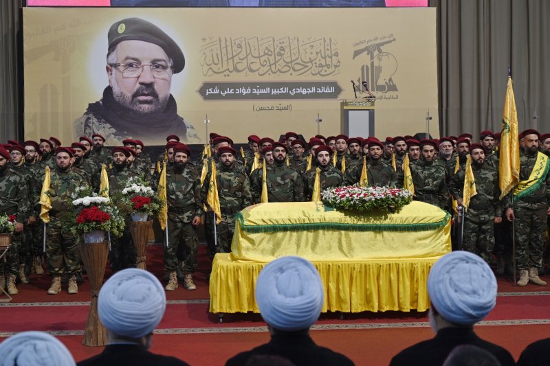 The U.S. Treasury Department Wednesday announced sanctions against a Hezbollah oil and LPG smuggling network that allegedly facilitated shipments to the Syrian government. Hezbollah fighters stand next to the coffin of late senior Hezbollah commander Fuad Shukr, killed in an Israeli strike, during the funeral procession in Beirut, Lebanon, Aug. 1,2024. File photo by Wael Hamzeh/ EPA-EFE