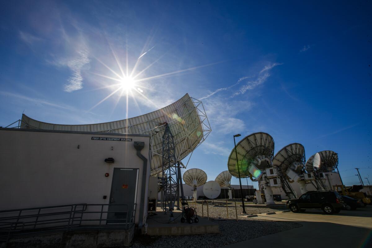 DirecTV satellite dishes.  (Allen J. Schaben / Los Angeles Times)