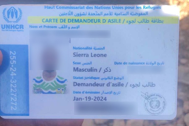 Anderson's official Asylum Seeker card, ignored by authorities following his arrest. Image credit: Anderson, 09.24