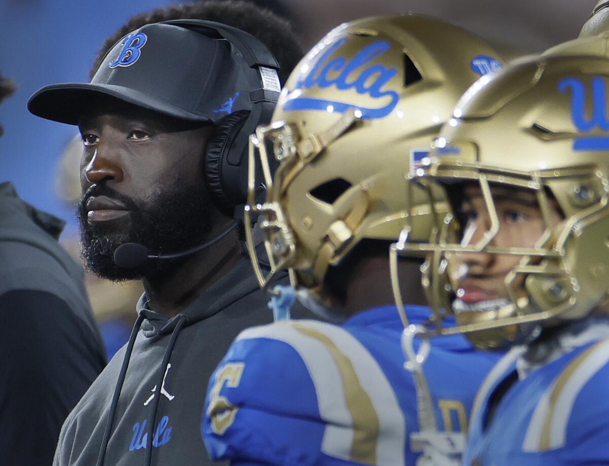 UCLA coach DeShaun Foster watches from the sideline during the final seconds of the Bruins' loss to Oregon on Saturday.