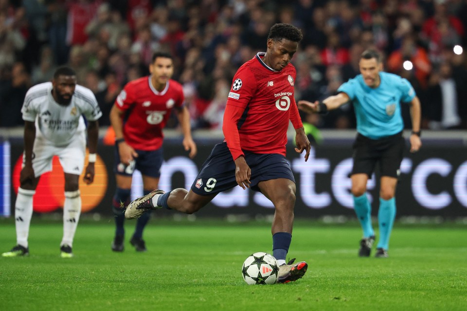 David tucks his spot-kick winner as Real's Aurelien Tchouameni looks on