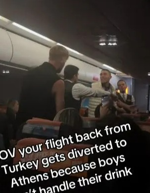 EasyJet cabin crew desperately try to hold the men apart