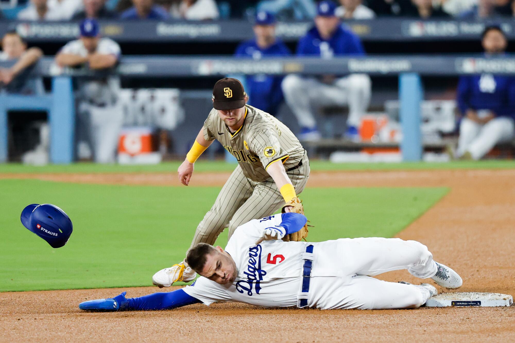 Dodgers baserunner Freddie Freeman beats the tag of San Diego second baseman Jake Cronenworth.