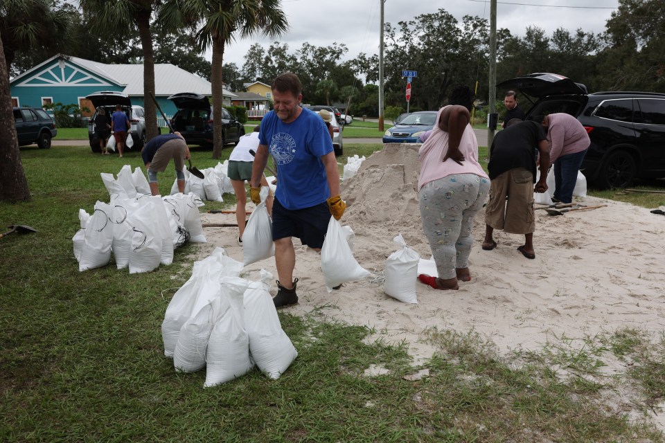 People fill sandbags in St Petersburg as the state prepares for the arrival of Hurricane Milton