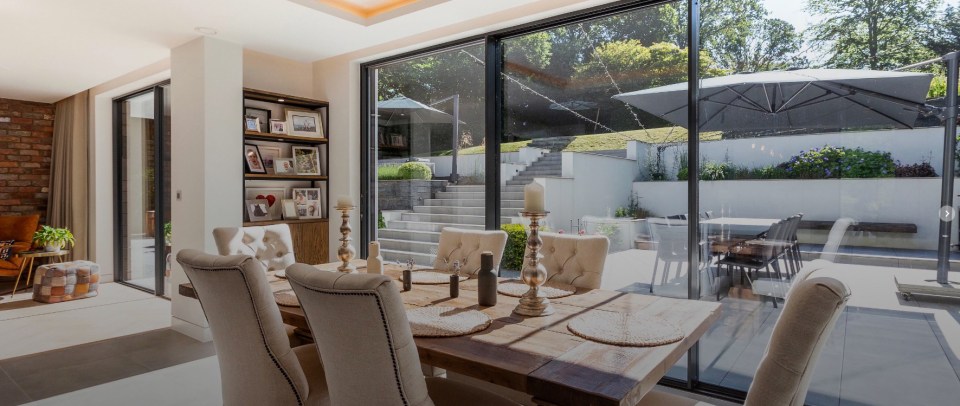 The kitchen and family room overlook a garden terrace