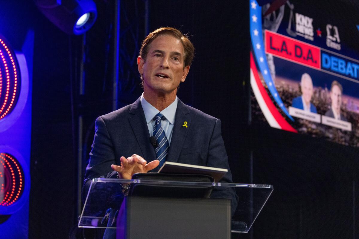 Nathan Hochman speaks at the debate. 