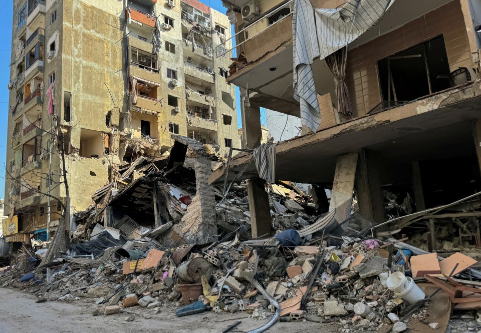 A view shows damaged buildings, in the aftermath of Israeli strikes on Beirut’s southern suburbs on October 9