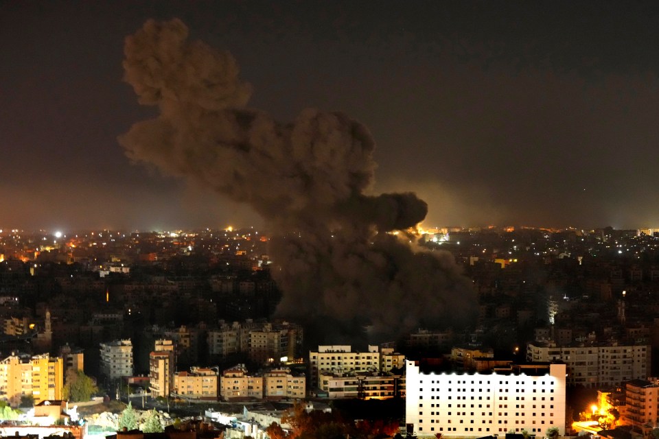 Smoke rises from an Israeli airstrike in Dahiyeh on October 8