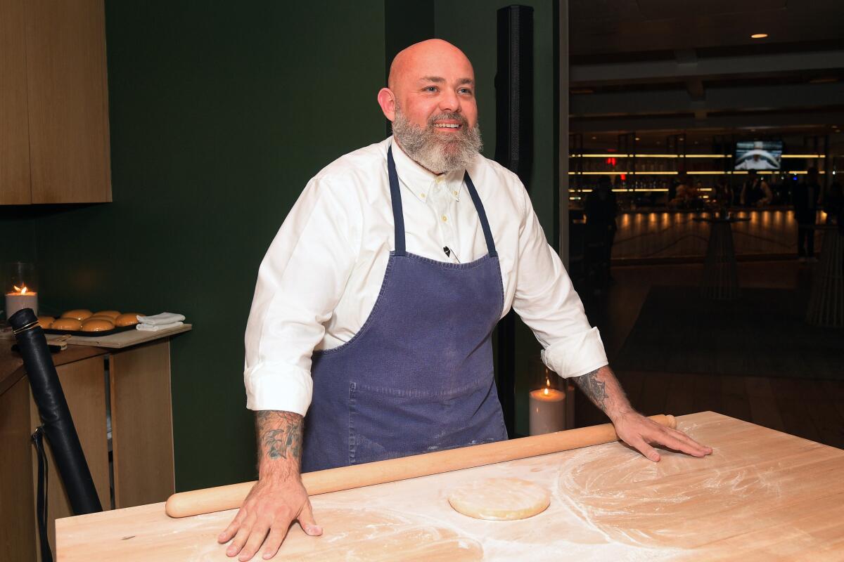 Evan Funke gives a pasta demonstration during a Netflix event at his Beverly Hills restaurant Funke.