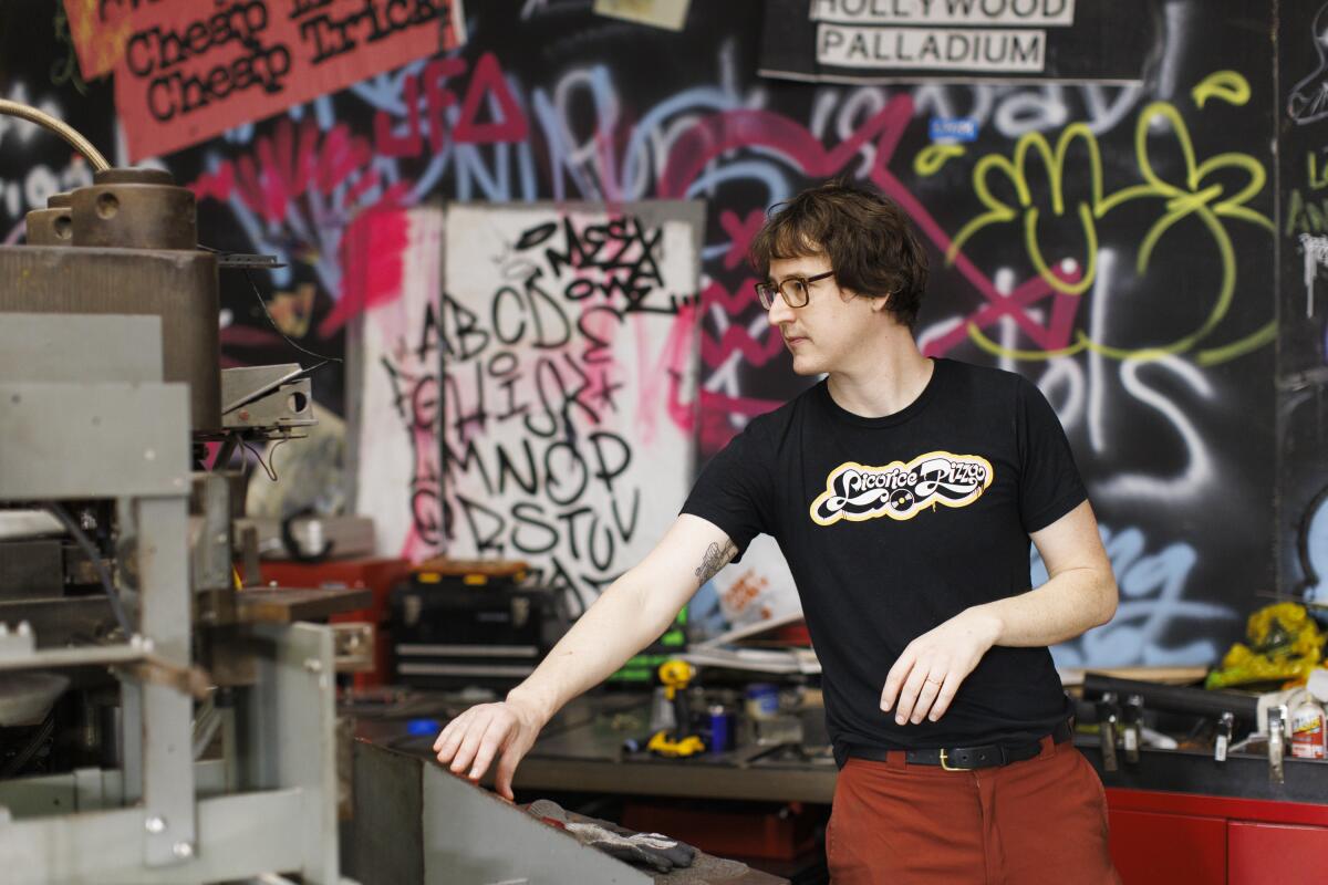 Man working at a vinyl pressing plant