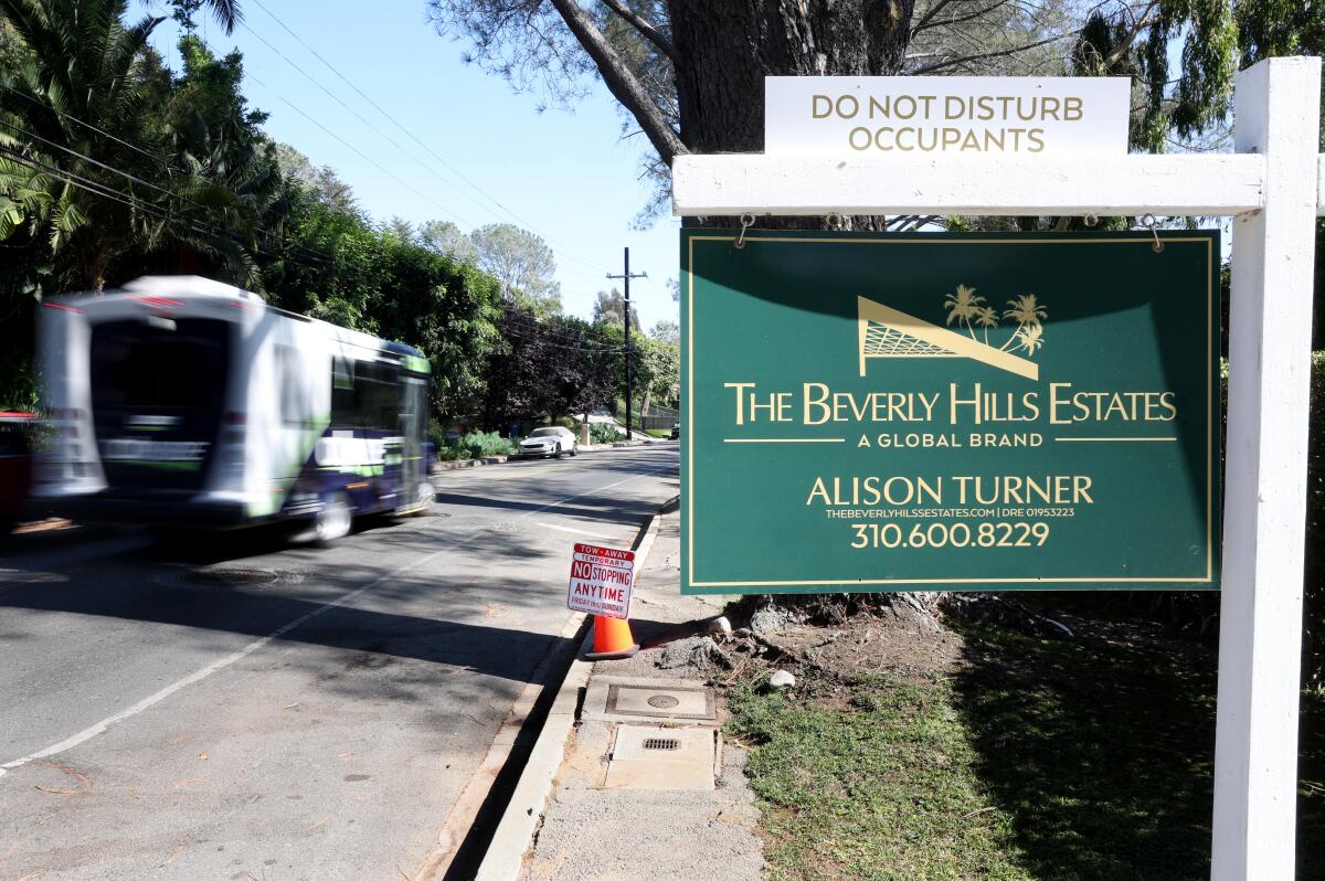 A real estate sign on the street where Vice President Kamala Harris has a home.