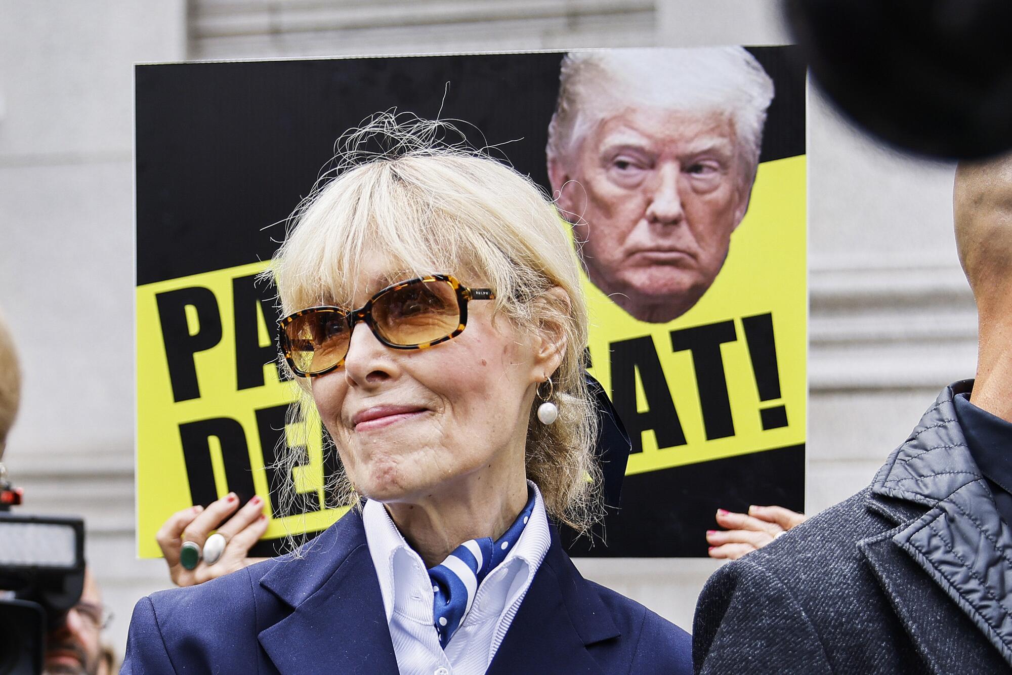 E. Jean Carroll exits a courthouse