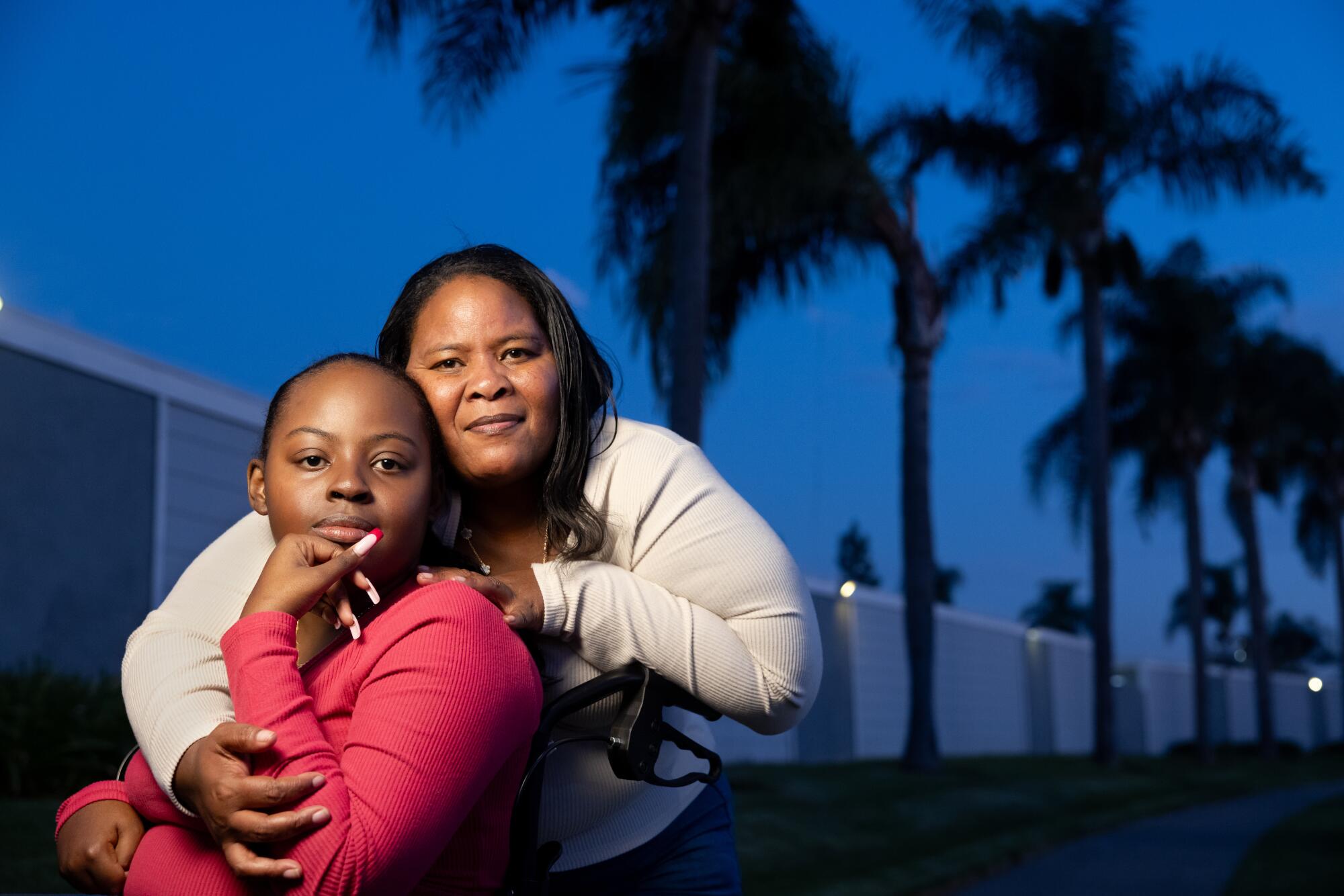 Chereé Peoples and her daughter Shayla Rucker are photographed at home.