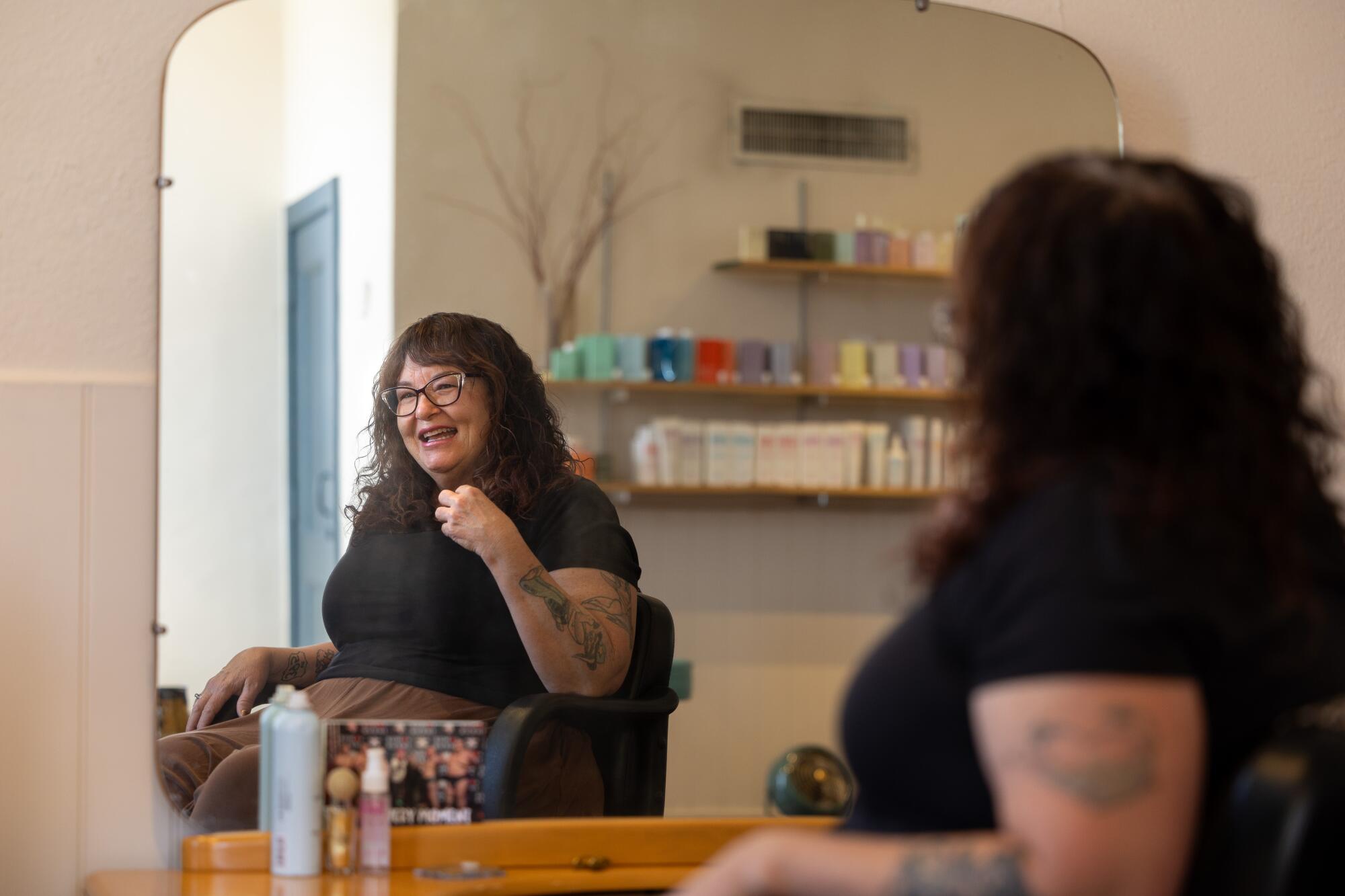 A woman in a hair salon. 