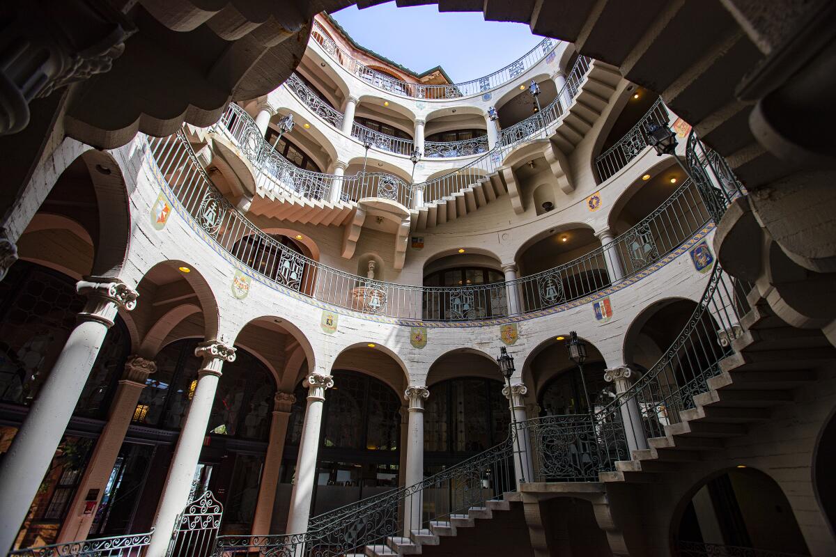 Rotunda of the Mission Inn Hotel with winding staircase and ornate columns