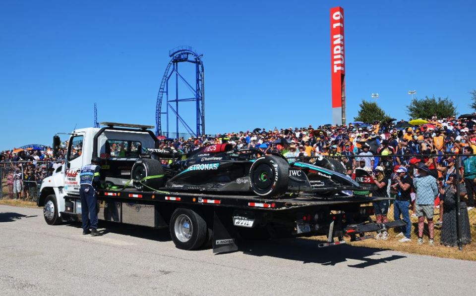 Hamilton's Mercedes had to be towed away