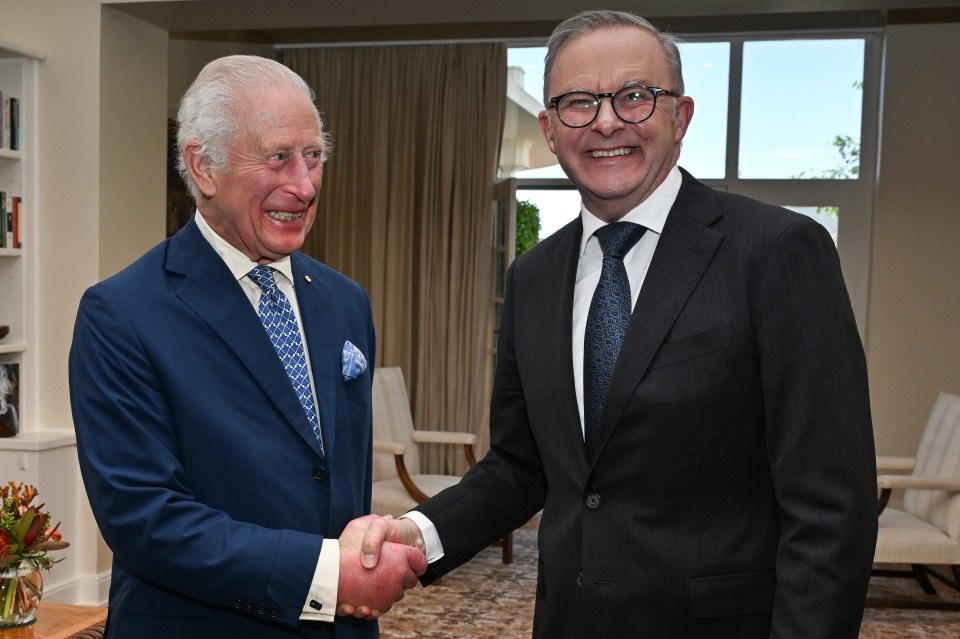 Charles shakes hands with Australian Prime Minister Anthony Albanese