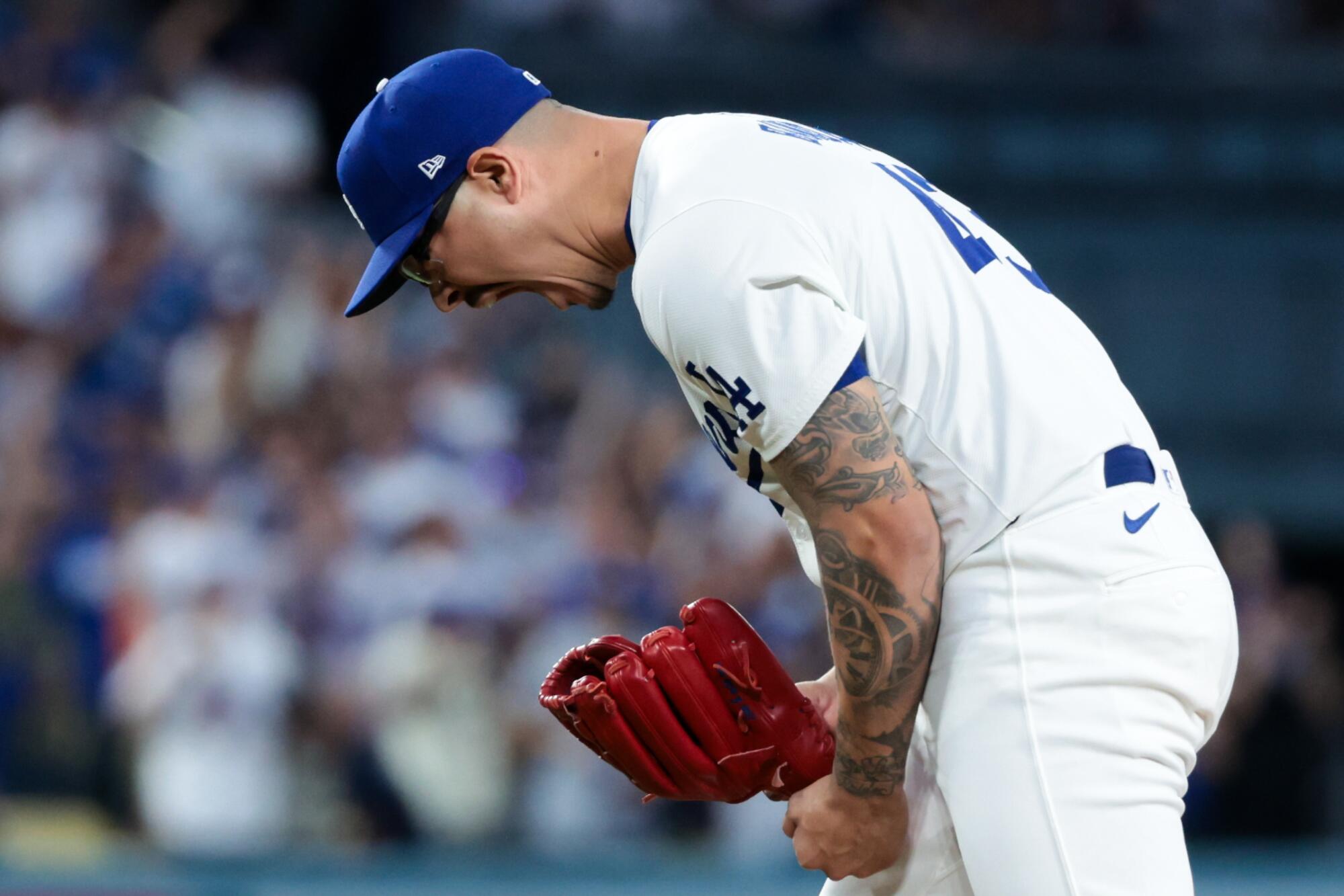 The Dodgers' Anthony Banda reacts after striking out the Mets' Jeff McNeil