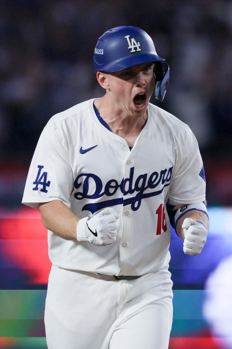 Will Smith celebrates after hitting a two-run home run in the third inning against the Mets.