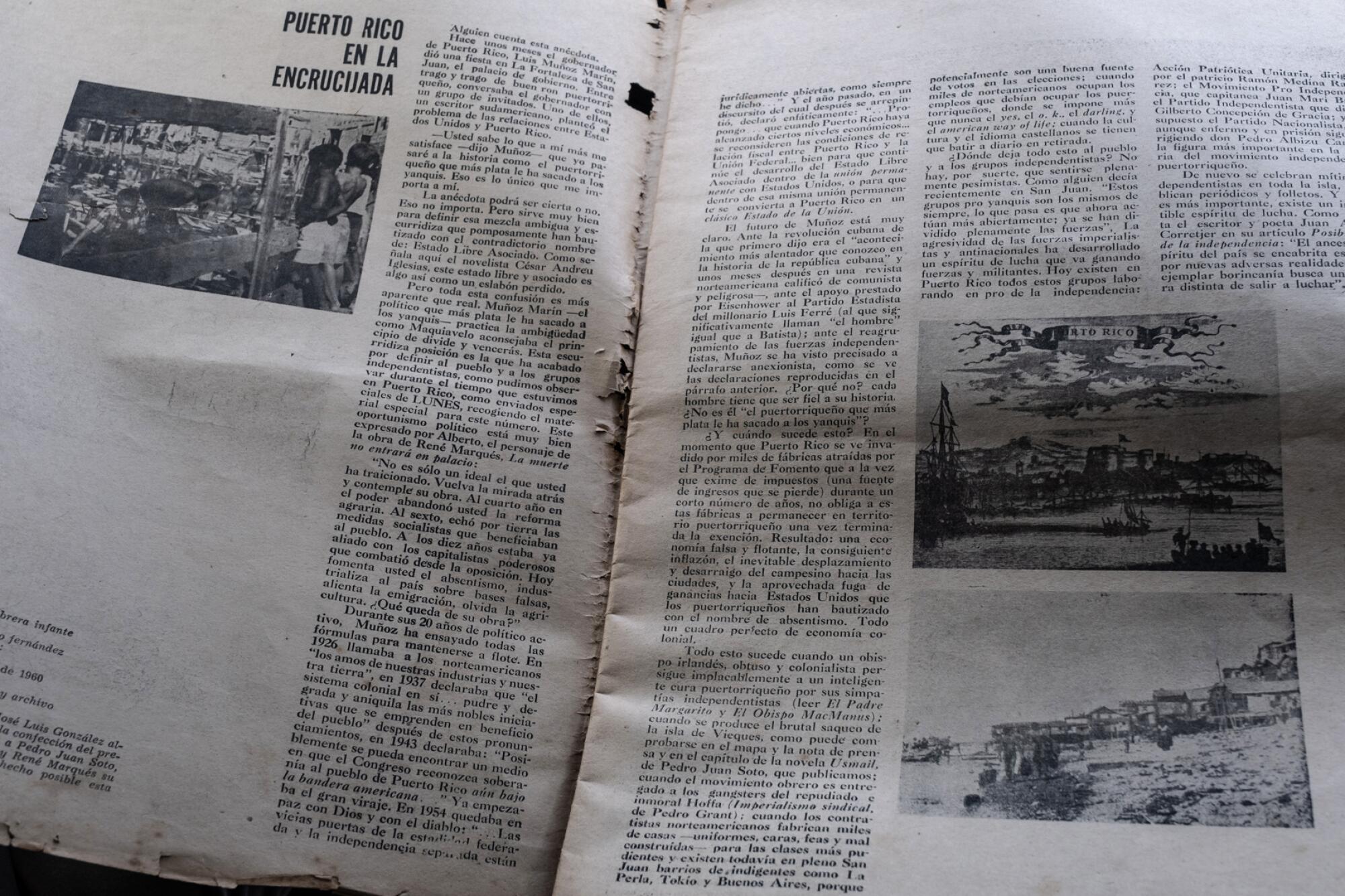 The headline inside an old black-and-white tabloid reads, "Puerto Rico en la Encrucijada," or "Puerto Rico at a Crossroads."