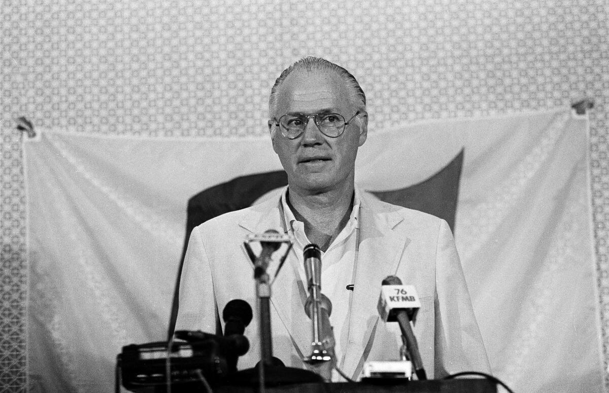 MLB commissioner Bowie Kuhn speaks during a news conference in San Diego on Aug. 19,1982.