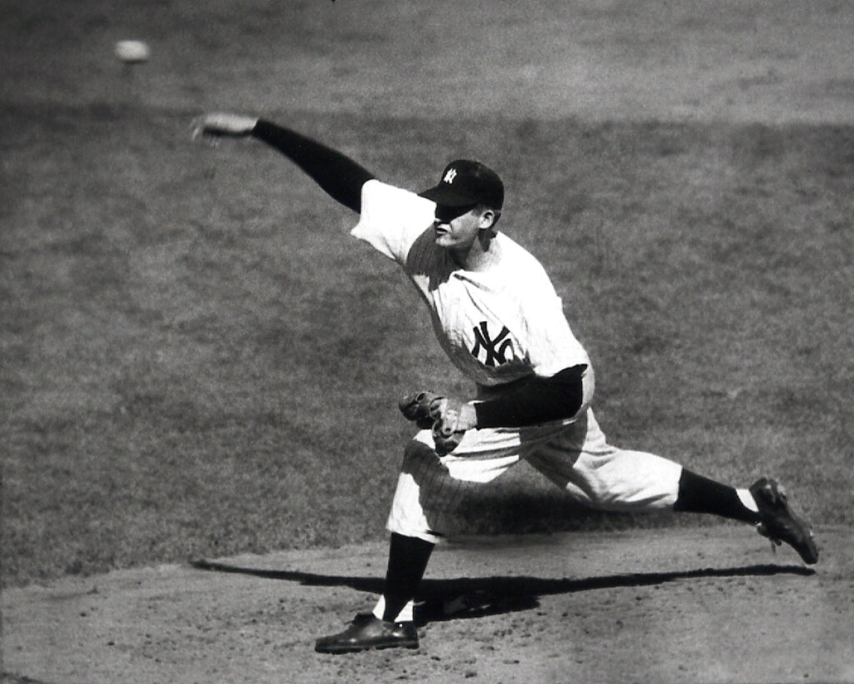 New York Yankees right-hander Don Larsen delivers a pitch in the fourth inning of Game 5.