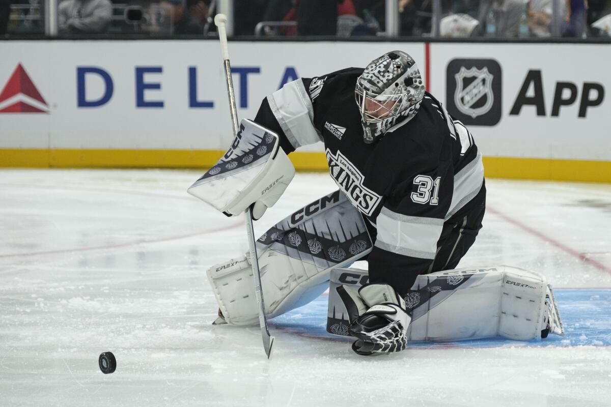 Kings goaltender David Rittich makes a save during the first period against the San Jose Sharks.