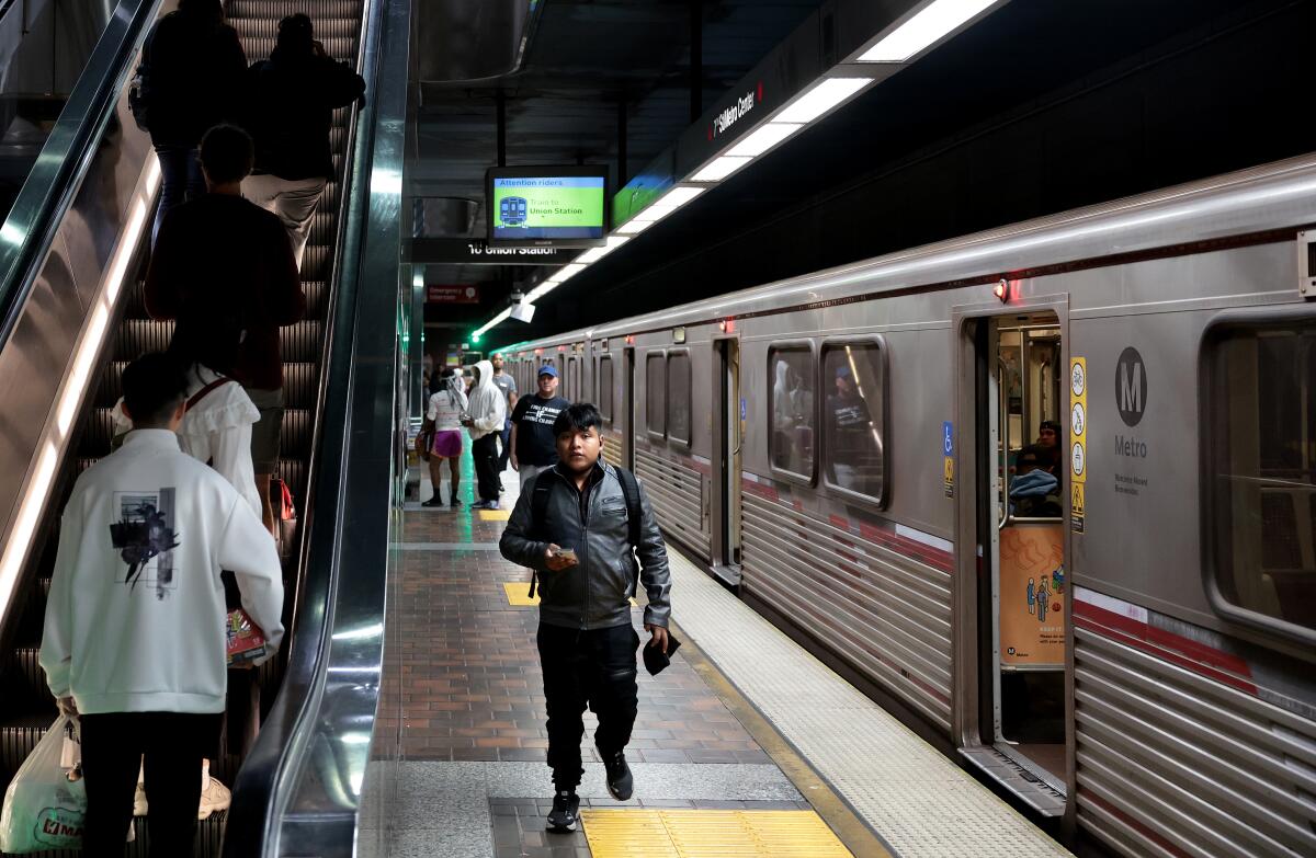 Passengers ride the Metro Red Line in Los Angeles Wednesday. (Wally Skalij/Los Angeles Times)