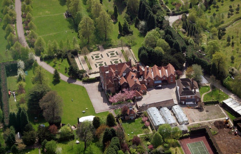 Surrey Police is also investigating a report of sex abuse at his Oxted mansion