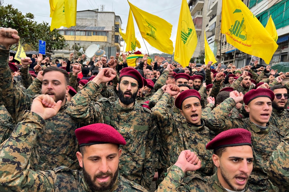 Hezbollah militants at the funeral of Ali al-Debs, one of the group’s commanders killed by an Israeli air raid