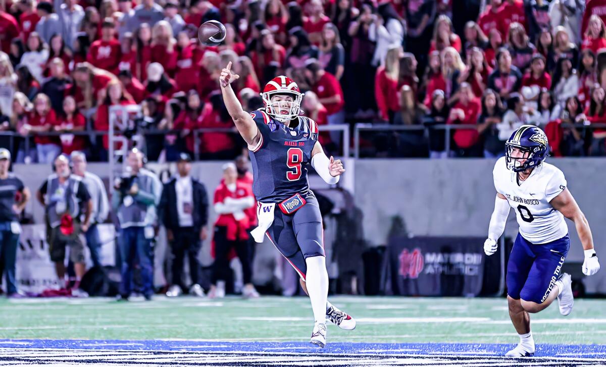 Mater Dei quarterback Dash Beierly launches a pass against St. John Bosco. 