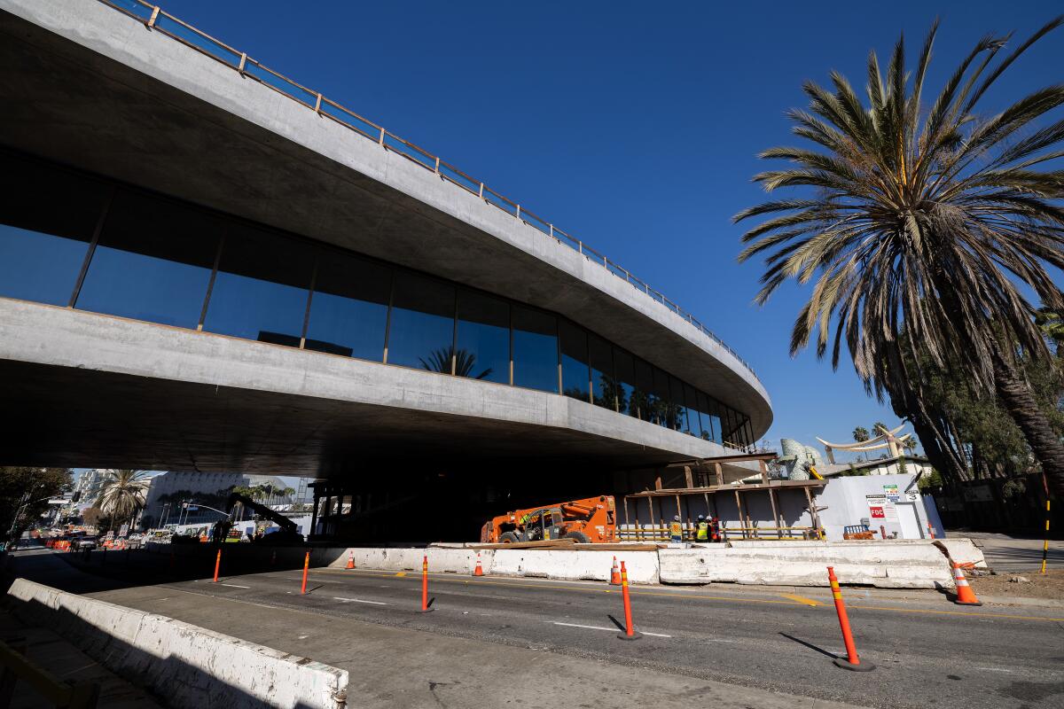 LACMA's new Peter Zumthor-designed David Geffen Galleries cross over Wilshire Boulevard.