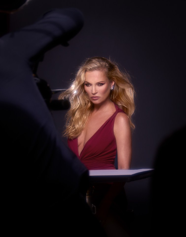 Supermodel Kate Moss stunned in a burgundy dress for the campaign