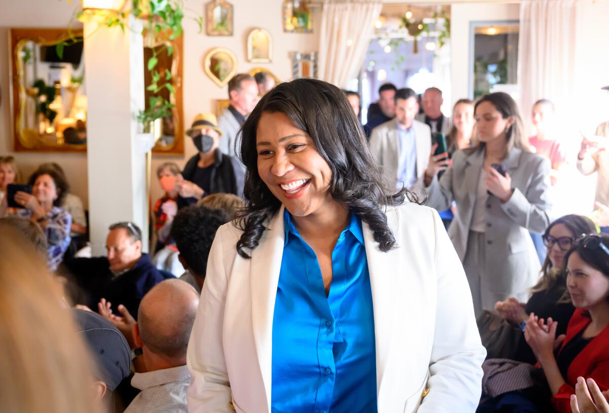 San Francisco Mayor London Breed smiles to a crowd of supporters