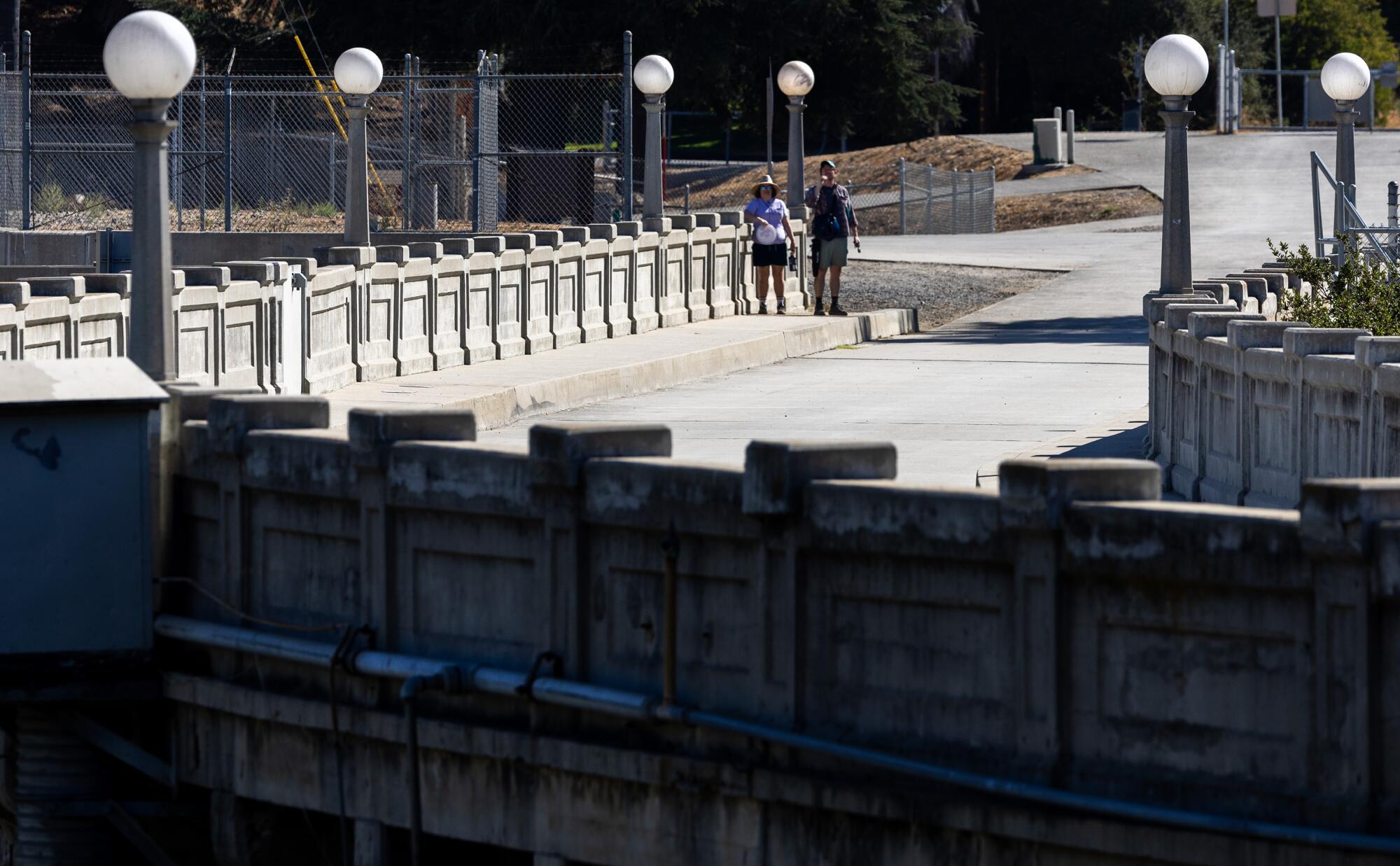 McLeod and Sodaro on the Devil's Gate Dam. 