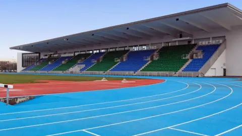 Glasgow Life The blue running track of Scotstoun stadium. 