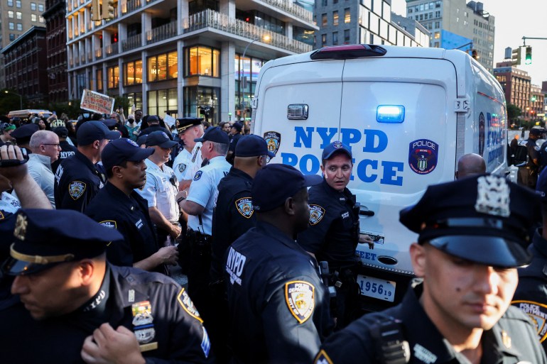 Police officers operate as people protest the death of Jordan Neely, a man whose death has been ruled a homicide by the city's medical examiner after being placed in a chokehold by a fellow passenger on a New York City subway train, in New York City, U.S., May 8, 2023. REUTERS/Andrew Kelly