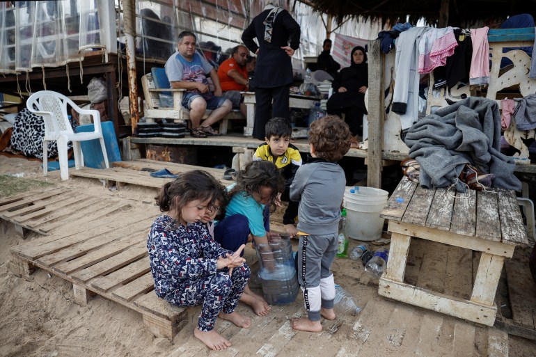 Makeshift encampment for displaced families at beach in Beirut