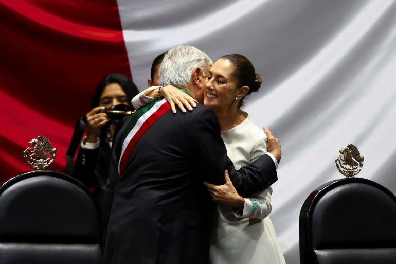 Mexico's President Andres Manuel Lopez Obrador and President-elect Claudia Sheinbaum embrace