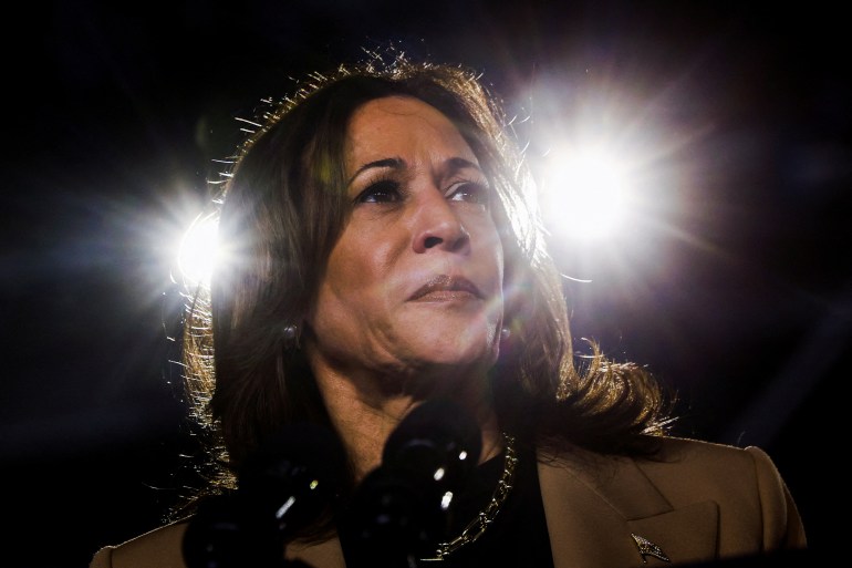 Kamala Harris, with two lights visible behind her