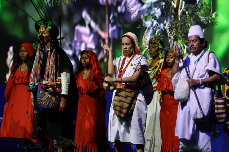 Colombian Indigenous people of different ethnicities participate in the opening of the 16th United Nations Biodiversity Summit in Cali